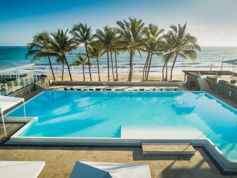 View Across the Pool to the Water at the Millennium Resort and Spa