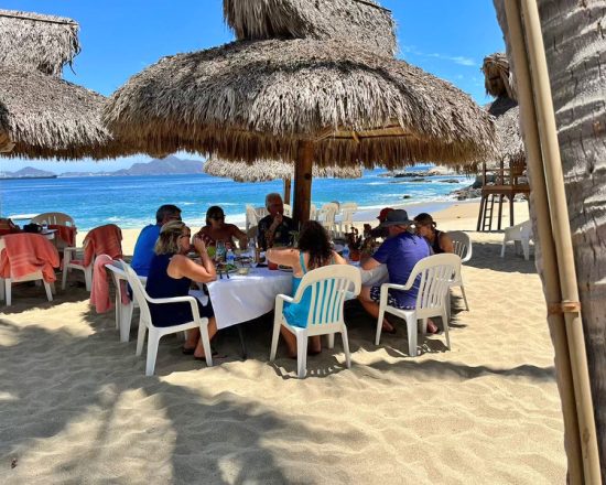 Casa de Sofia guests dining on the beach