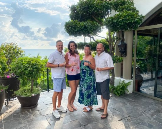 Casa de Sofia guests enjoying drinks on the stone patio