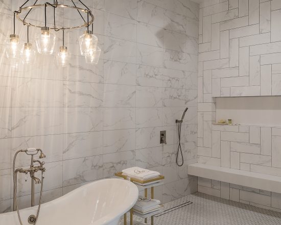 Blue Island Villa Master bathroom with marble tile and chandelier