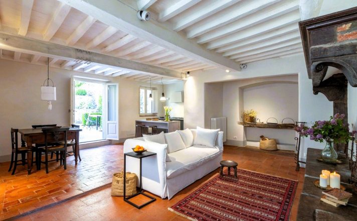 View of the Bella Aura apartment showing the entire open floorplan: Dining area, living room, and kitchen