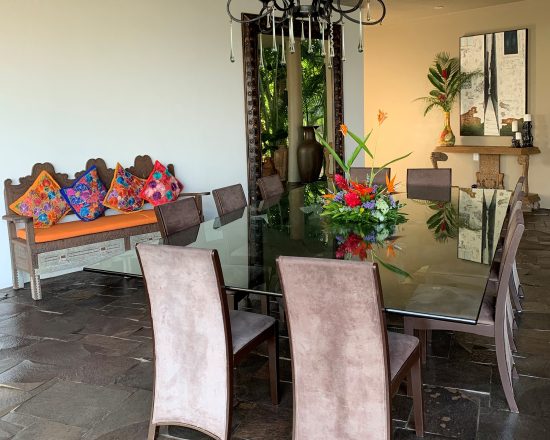 Casa de Sofia dining room with glass top table