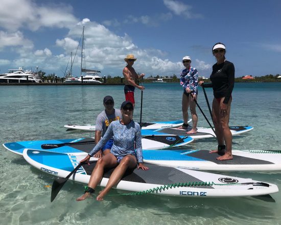 Blue Island Villa guests enjoying a paddleboard tour